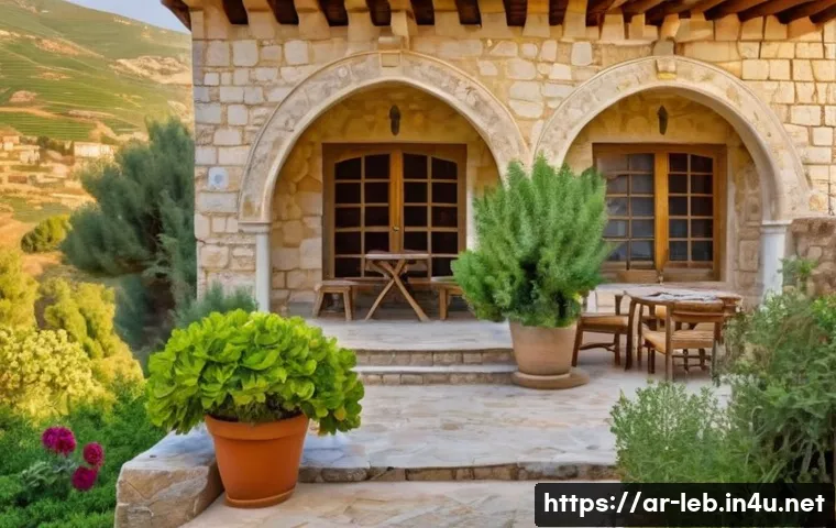 레바논 주택 구조 및 건축 스타일 - An exterior view of a traditional Lebanese mountain house made of warm yellow natural stone. The hou...